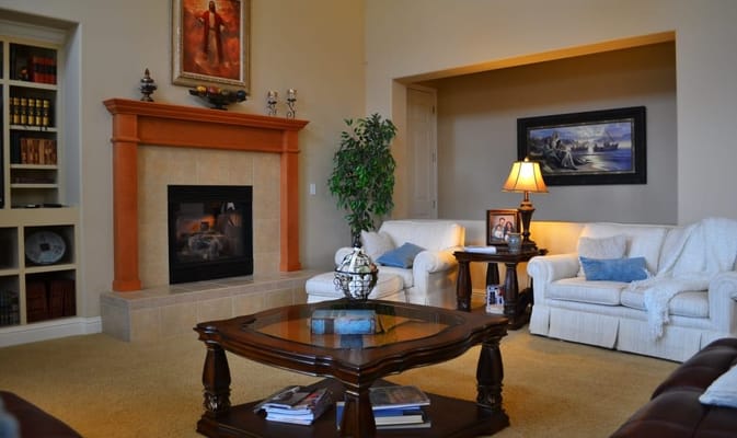Cozy common area with seating and fireplace