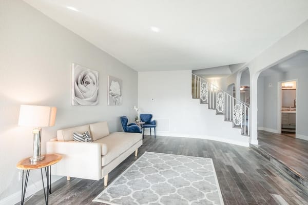 Bright interior common area with a sofa and decor