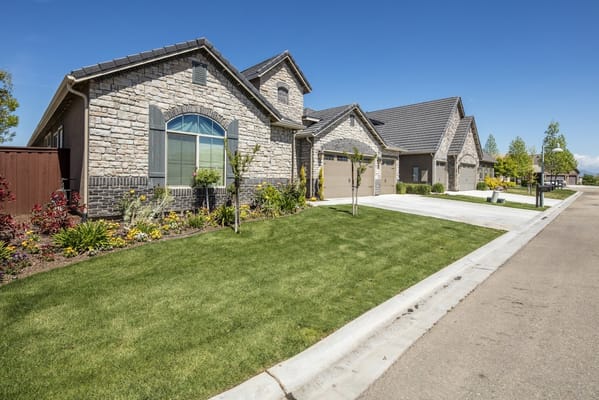 Exterior view of a residential building in a landscaped setting