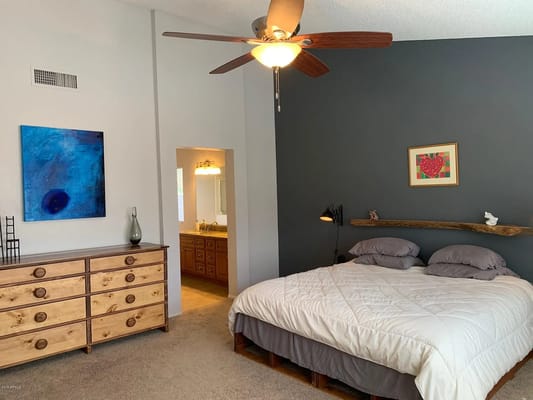 Well-decorated bedroom with simple furnishings