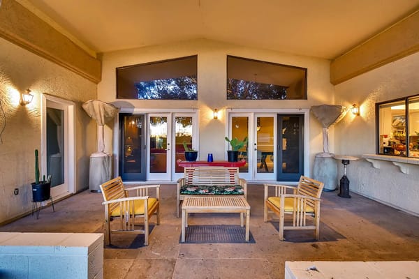 Patio with seating and decor at Amiga 2 Assisted Living Home