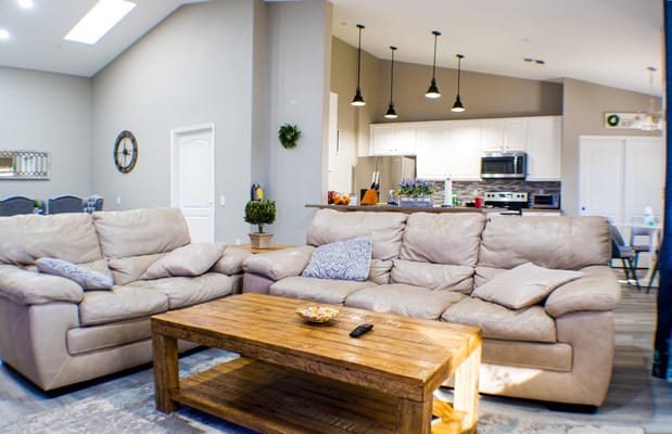 Cozy living room with comfortable sofas and a wooden coffee table