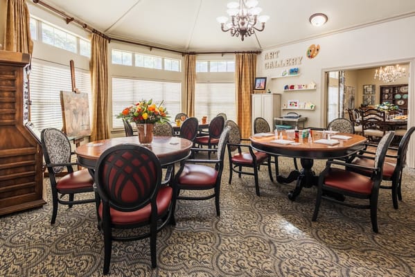 Cozy common area with dining tables and decor