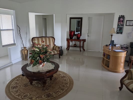 Bright living room with decorative furniture and plants