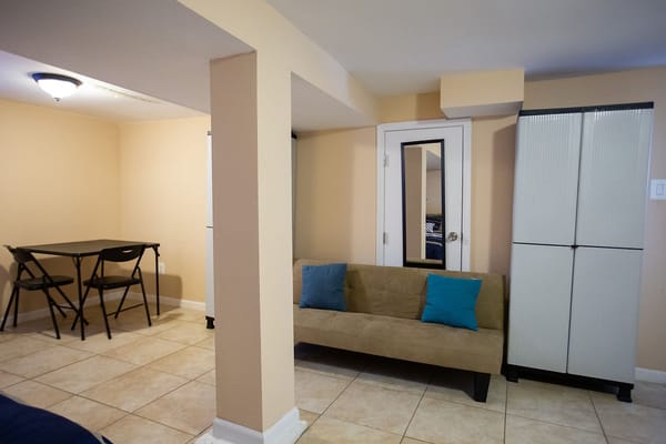 Cozy living area with a couch and dining table