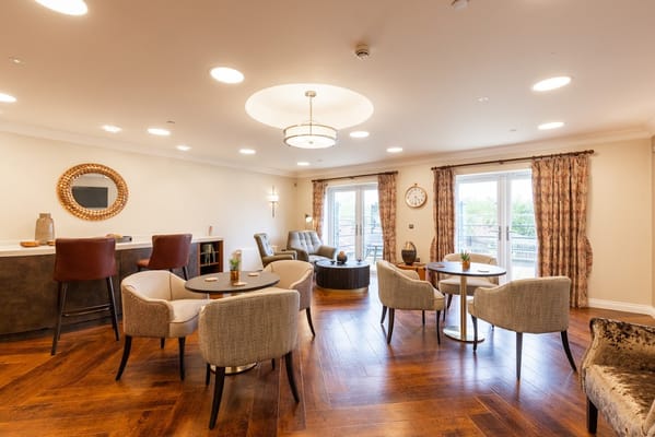 Interior view of a cozy common area with seating