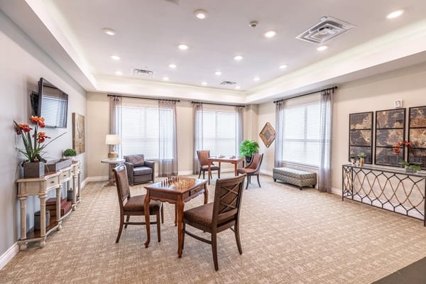 Interior lounge area with seating and game tables