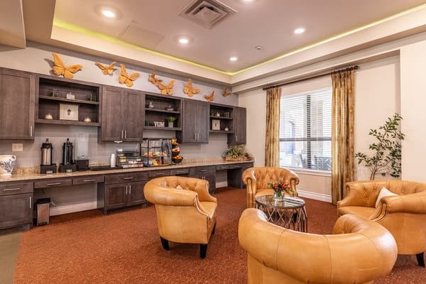 Common area with seating and butterfly decor