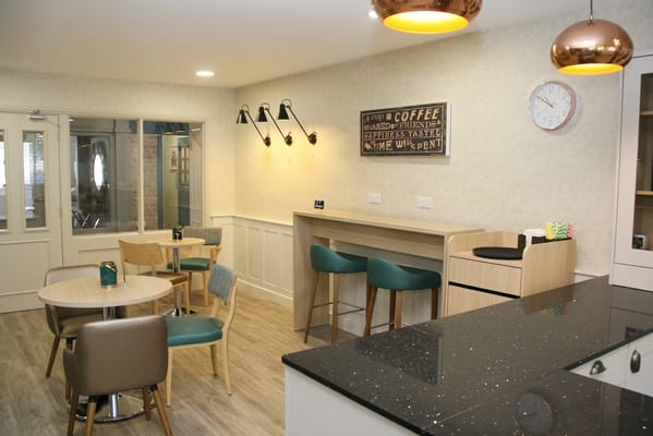 Bright common area with seating and decor