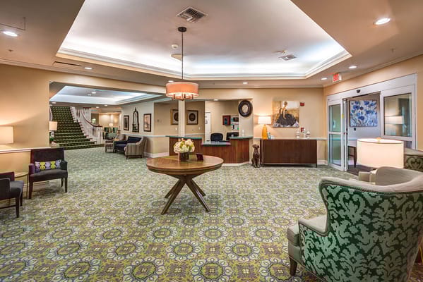 Cozy lobby with seating and a welcoming atmosphere at Greatwood at Sugar Land.