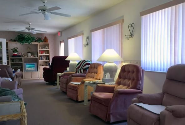 Common area with chairs and lamps in the facility