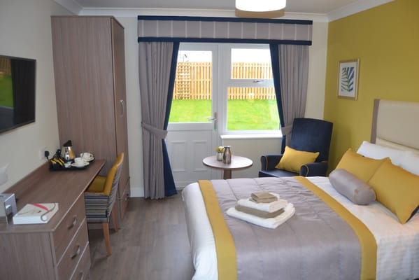 Bright and inviting resident room with modern decor