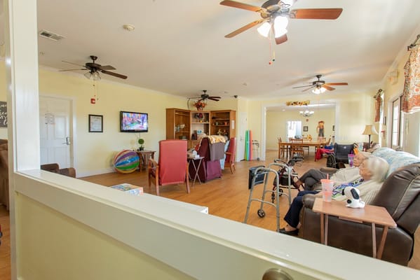 Residents enjoying time in a lively common area