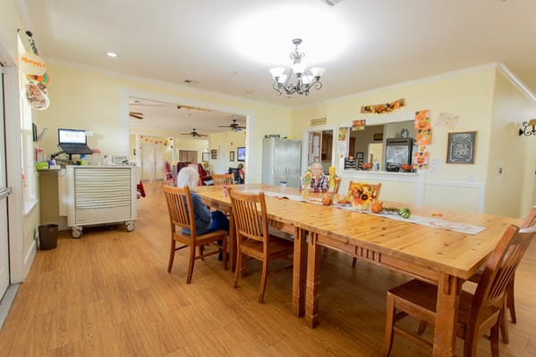 Dining area with residents enjoying a meal