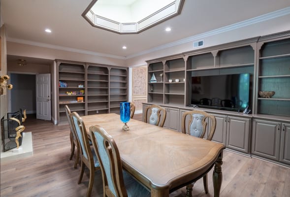 Bright, welcoming common area with a dining table