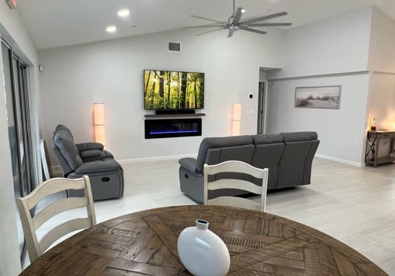 A bright common area with modern furniture and decor