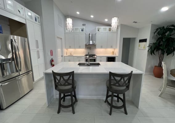 Interior view of a modern kitchen with seating