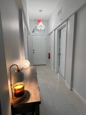 Bright hallway with modern lighting and decor