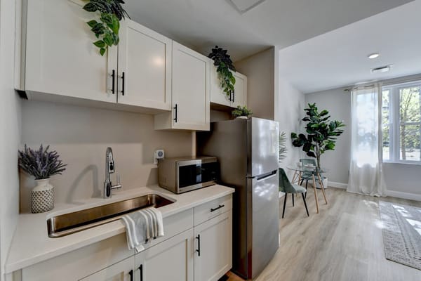 Well-lit kitchenette in a modern interior space