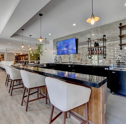 Bright and modern interior bar area with seating