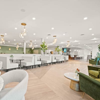 Bright common area with seating and plants