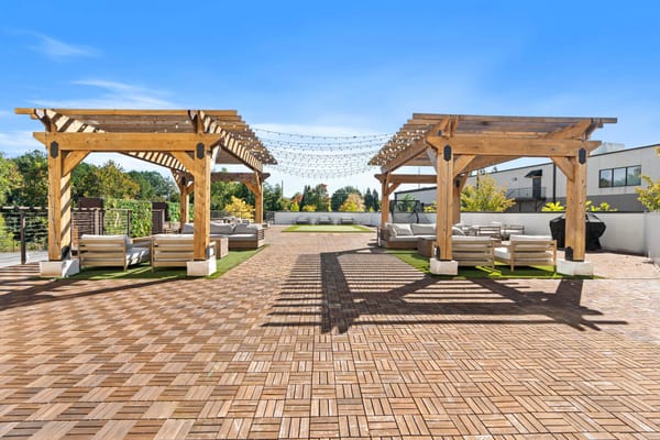 Outdoor lounge area with pergolas and seating