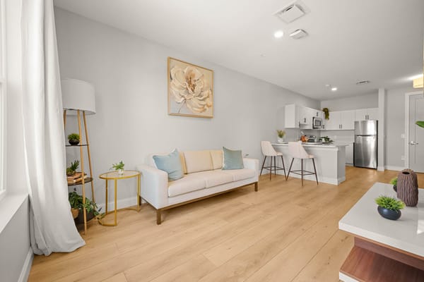 Bright and modern interior with seating area and kitchen