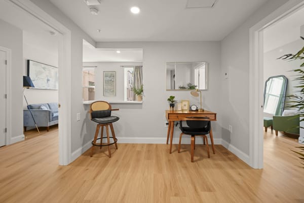 Interior view of a bright resident room with furnishings