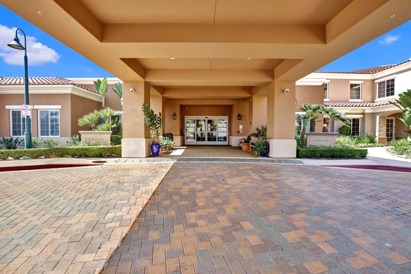 Entrance of GlenBrook Health Center with landscaped grounds