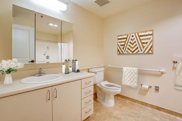 Bright, clean bathroom in a resident's room