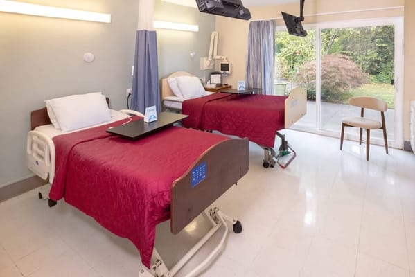 Private resident room with two beds and a view