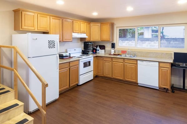 Bright kitchen interior with wooden cabinets