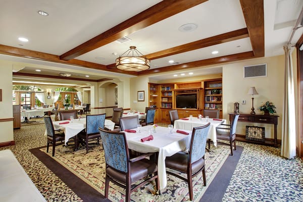 Dining room with tables set for meals