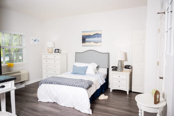Bright and serene bedroom in a senior living facility