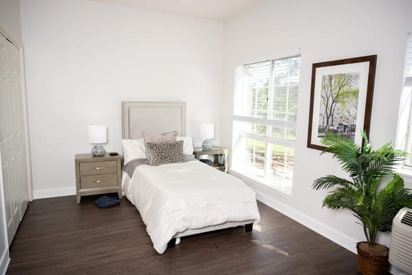 Cozy private room with a single bed and natural light