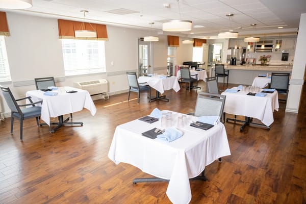 Dining area setup with tables and chairs