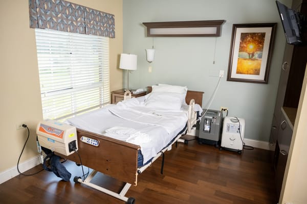 Private resident room with adjustable bed and decor