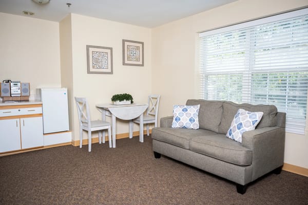 Cozy interior room with a couch and table