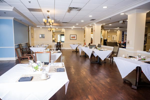 Dining area set with clean tables and chairs