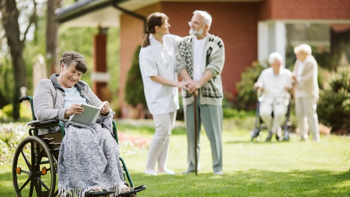 Residents enjoying time outdoors in a garden area