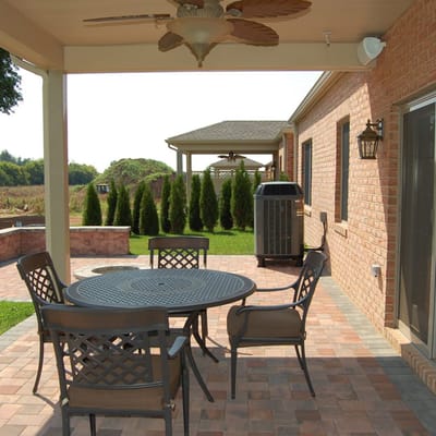 Outdoor seating area with a table and chairs