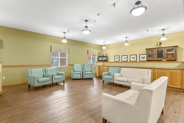 Bright common area with seating arrangements