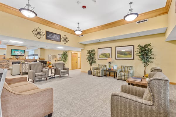 Bright common area with comfortable seating and decor