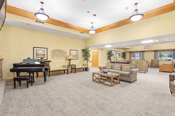 Common area with cozy seating and piano