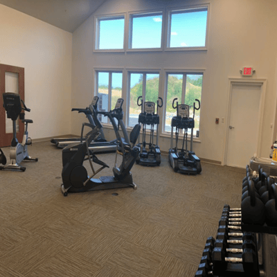 Interior view of a fitness area with exercise equipment
