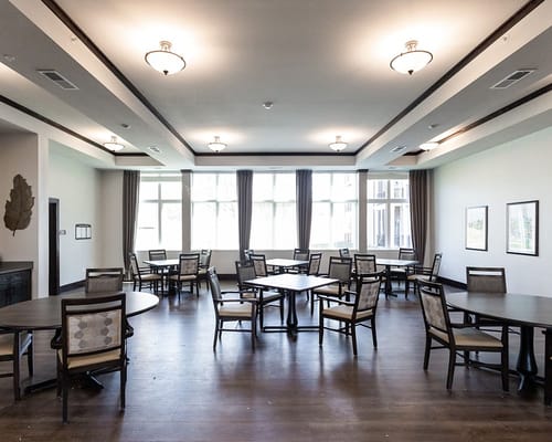 Interior common area with tables and chairs
