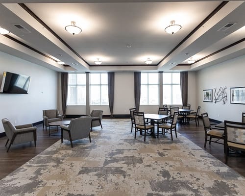 Interior common area with seating and natural light