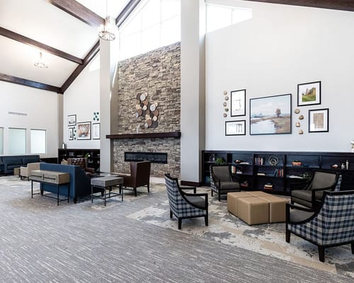 Bright common area with comfortable seating and decor