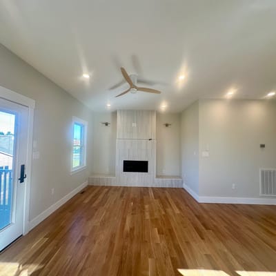 Bright interior room with wooden flooring and modern design