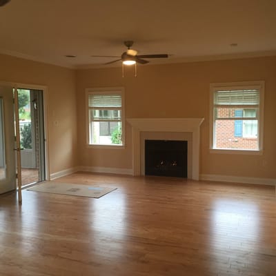 A bright interior living room with a fireplace
